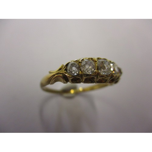 11 - An antique un-marked yellow gold ring set with 5 graduated diamonds, approx. ring size M, approx. we... 