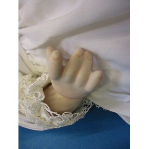 351 - A German porcelain doll, having no observed damage, approx. length 44cm