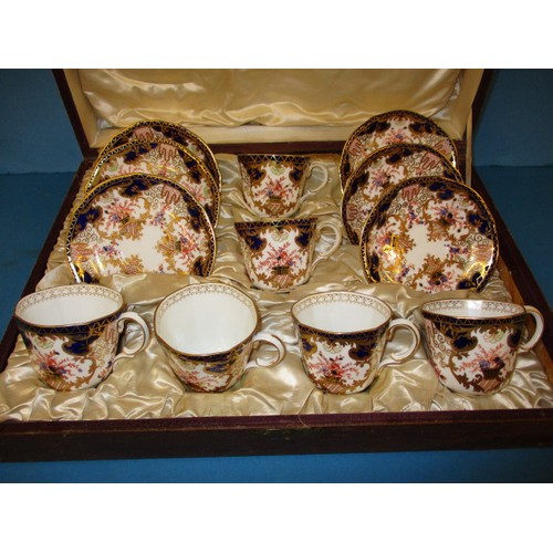 192 - An antique Royal Crown Derby boxed coffee set, date mark for 1918 pattern number 3788, no observed d... 