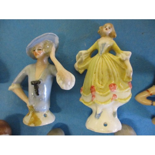 183 - A collection of antique and later porcelain half dolls, one having been broken at base and re-stuck ... 