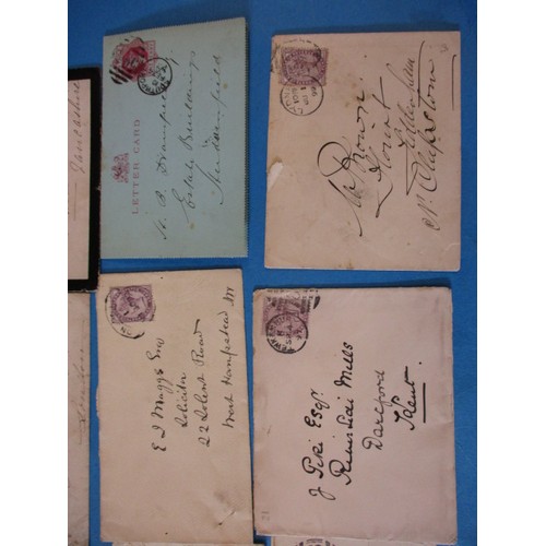 196 - A parcel of 19th century postal items to include Georgian letters and penny red stamps, all in used ... 