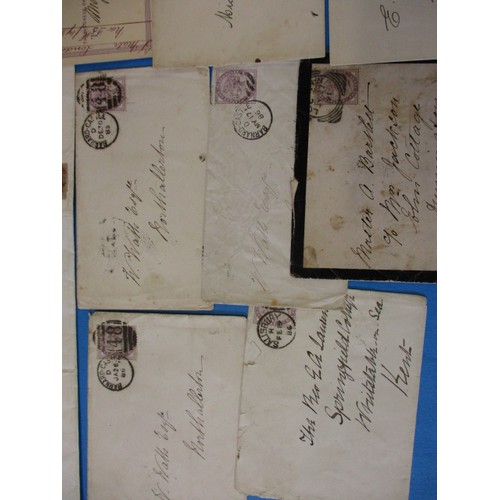 196 - A parcel of 19th century postal items to include Georgian letters and penny red stamps, all in used ... 