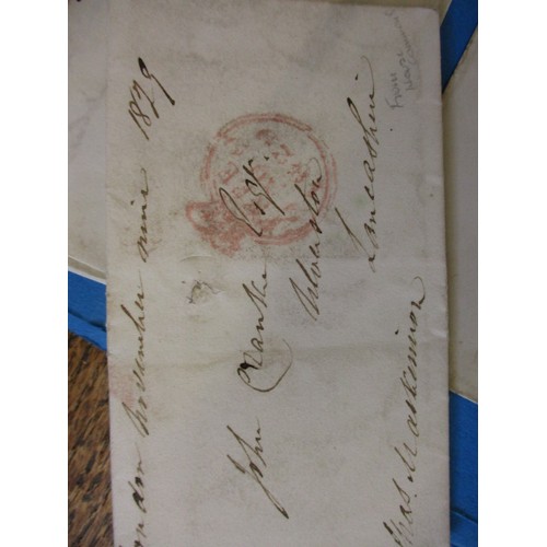 196 - A parcel of 19th century postal items to include Georgian letters and penny red stamps, all in used ... 