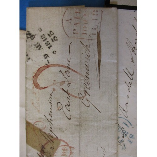 196 - A parcel of 19th century postal items to include Georgian letters and penny red stamps, all in used ... 