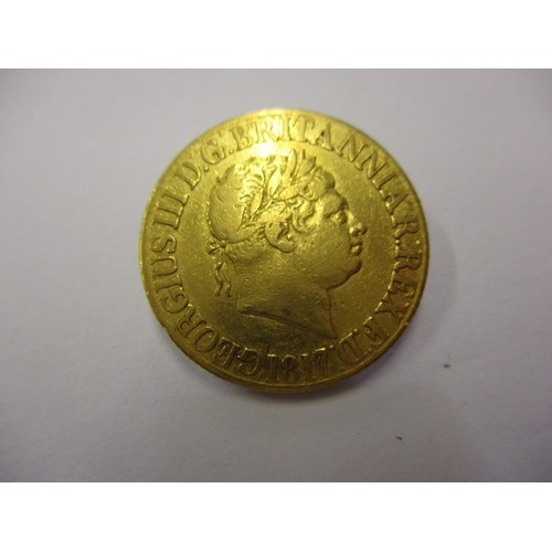 99 - A George III gold sovereign dated 1817, in a reasonable grade for age