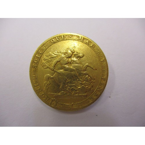 99 - A George III gold sovereign dated 1817, in a reasonable grade for age