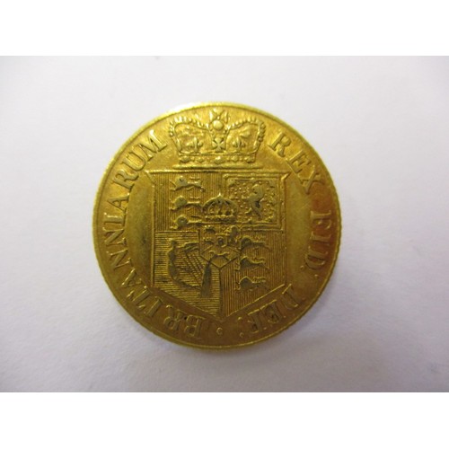 79 - A George III gold half sovereign dated 1817, a crisp reasonable grade coin with light signs of use