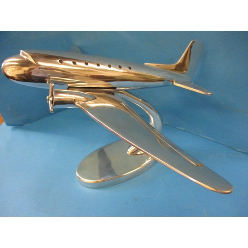 205 - A large cast aluminium model of a vintage aeroplane, approx. wingspan 55cm