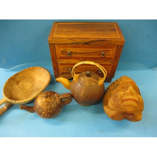 370 - 2 vintage coconut teapots and a nut mask, with two other treen items.