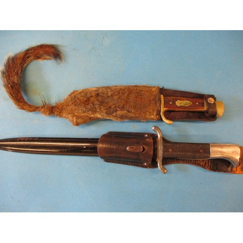 223 - A WWII German police? dagger in scabbard and a William Rodgers hunting knife, both in pre-owned cond... 