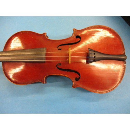 338 - A 1920s violin by Beare & Son, in hard case and with unmarked bow, in used condition with general ag... 