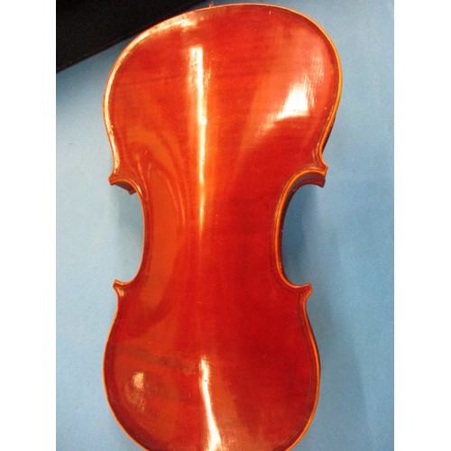 338 - A 1920s violin by Beare & Son, in hard case and with unmarked bow, in used condition with general ag... 