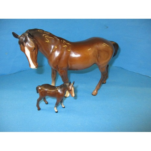 201 - A vintage Beswick horse and foal, both in good condition with no observed chips or damage