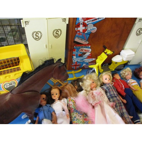 335 - A very large quantity of vintage Sindy dolls and accessories, to include horses, furniture and vehic... 