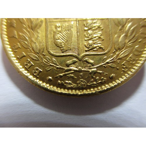 91 - An 1863 shield back sovereign, a fine grade coin, die number 3, a coin that’s been in circulation