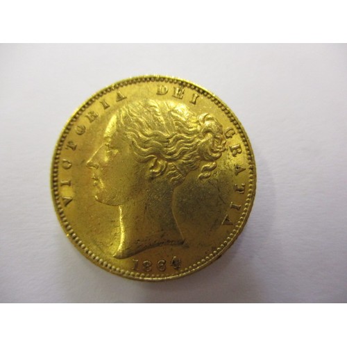 89 - An 1864 shield back sovereign, a fine grade coin, die number 30, a coin that’s been in circulation