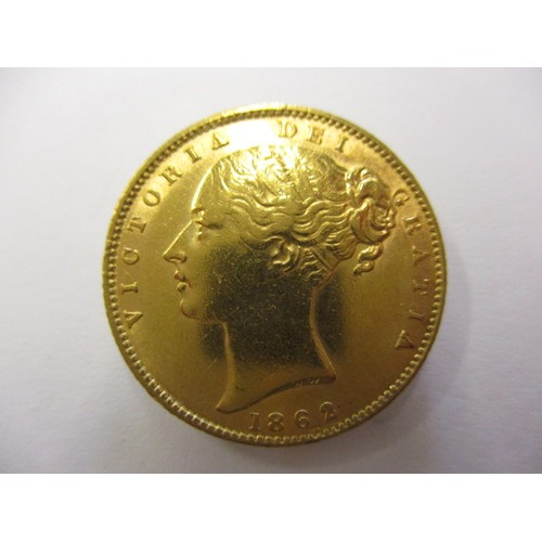 92 - An 1862 shield back sovereign, a fine grade coin, London mint, a coin that’s been in circulation