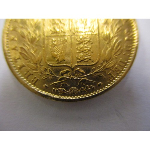 92 - An 1862 shield back sovereign, a fine grade coin, London mint, a coin that’s been in circulation