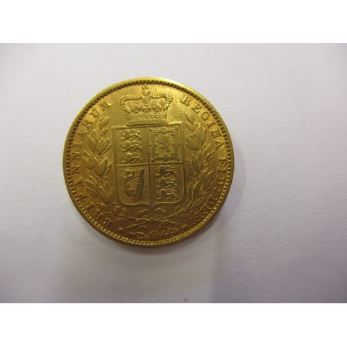 94 - An 1852 shield back sovereign, a fine grade coin, London mint, a coin that’s been in circulation