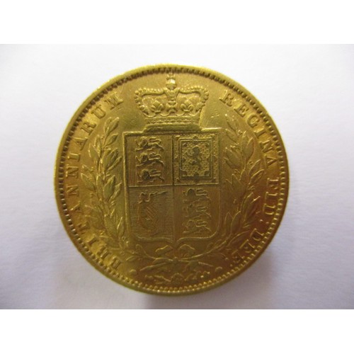 94 - An 1852 shield back sovereign, a fine grade coin, London mint, a coin that’s been in circulation