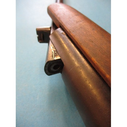 240 - A vintage break barrel .177 air rifle with open sight, in working order with general use related mar... 