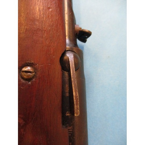 243 - A vintage BSA .22 under leaver air rifle, in working order with general use related marks, approx. l... 