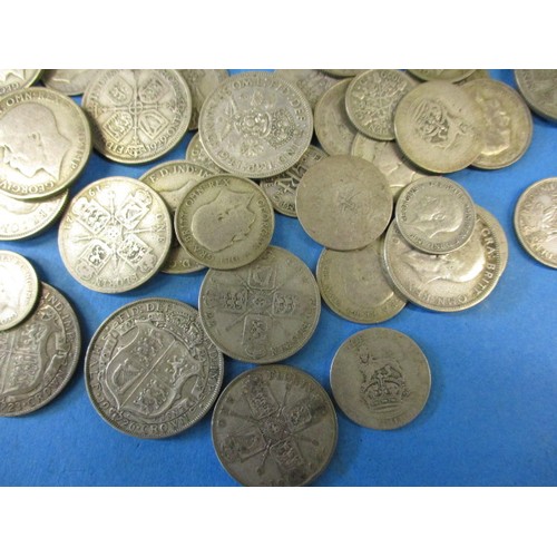 126 - A quantity of pre 1947 part silver coins, approx. weight 780g all in circulated condition