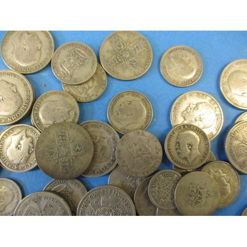 126 - A quantity of pre 1947 part silver coins, approx. weight 780g all in circulated condition