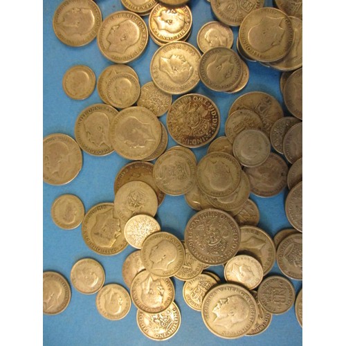 126 - A quantity of pre 1947 part silver coins, approx. weight 780g all in circulated condition