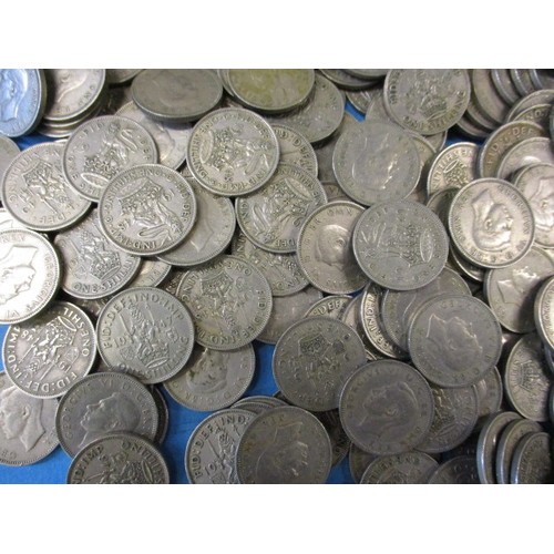 128 - A very large quantity of pre-decimal 1 shilling coins, approx. 8.2kg and over 1400 coins in total al... 