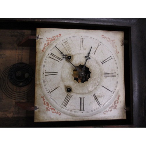 306 - A 19th century Ansonia patent brass wall clock. With pendulum, key and weights, not tested for funct... 