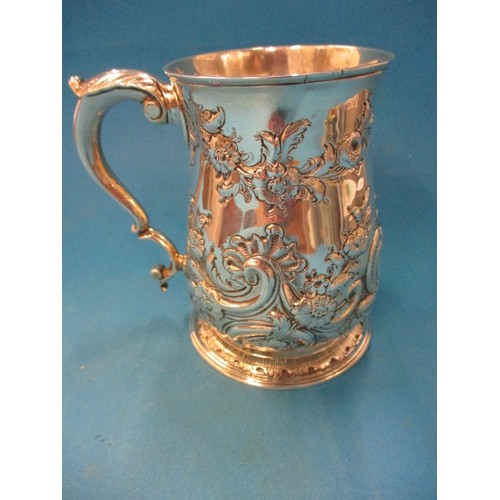 151 - A mid 18th century sterling silver tankard, London hallmark, approx. weight 344.7g, having a few sma... 