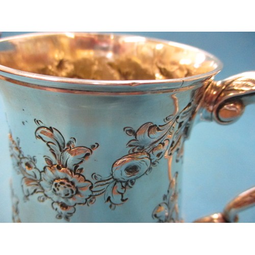 151 - A mid 18th century sterling silver tankard, London hallmark, approx. weight 344.7g, having a few sma... 