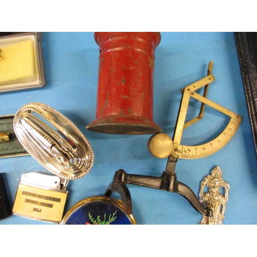 219 - A parcel of interesting collectables, to include military items, watches and lighters, all with gene... 