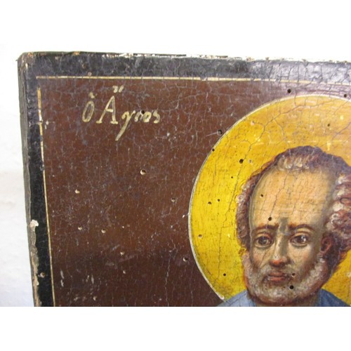 321 - A late 18th early 19th century painted wood panel depicting the Greek Saint Nicholas, a Saint coveri... 