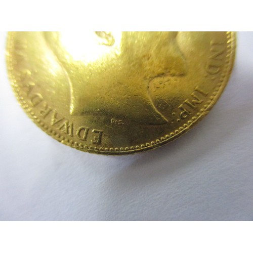 77 - An Edward VII full gold sovereign dated 1909, a BV grade coin that’s been in circulation