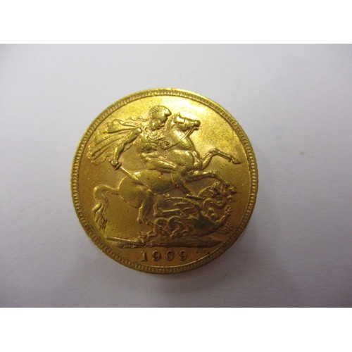 76 - An Edward VII full gold sovereign dated 1909, a fine grade coin that’s been in circulation