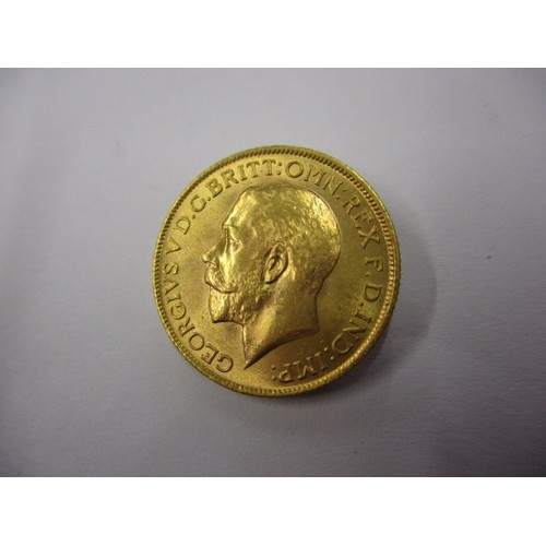 73 - A George V full gold sovereign dated 1914, a fine grade coin that’s been in circulation