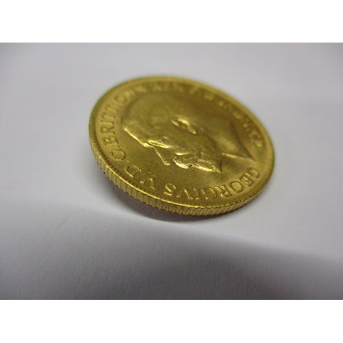 73 - A George V full gold sovereign dated 1914, a fine grade coin that’s been in circulation