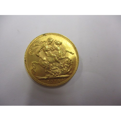 73 - A George V full gold sovereign dated 1914, a fine grade coin that’s been in circulation