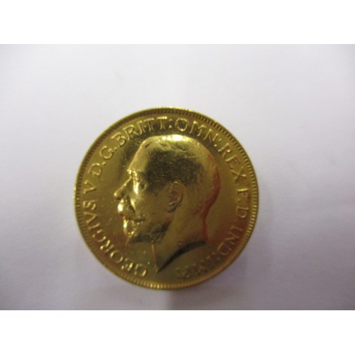 72 - A George V full gold sovereign dated 1920, a BV grade coin that’s been in circulation