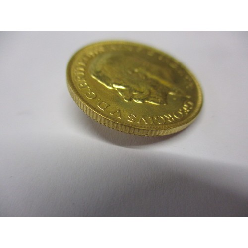 72 - A George V full gold sovereign dated 1920, a BV grade coin that’s been in circulation