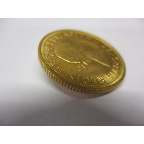 71 - A Queen Elizabeth II full gold sovereign dated 1968, a good grade coin that’s possibly been in a mou... 