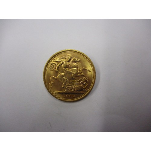 71 - A Queen Elizabeth II full gold sovereign dated 1968, a good grade coin that’s possibly been in a mou... 