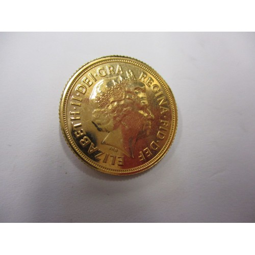 70 - A QEII full gold sovereign dated 2013, an uncirculated coin with minor surface marks