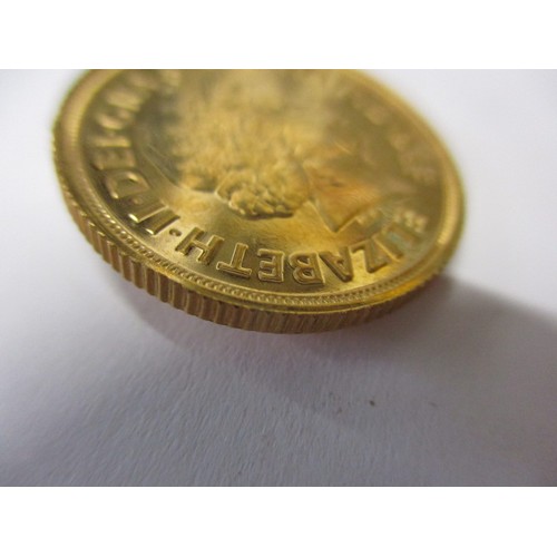 70 - A QEII full gold sovereign dated 2013, an uncirculated coin with minor surface marks