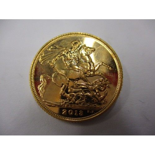 70 - A QEII full gold sovereign dated 2013, an uncirculated coin with minor surface marks