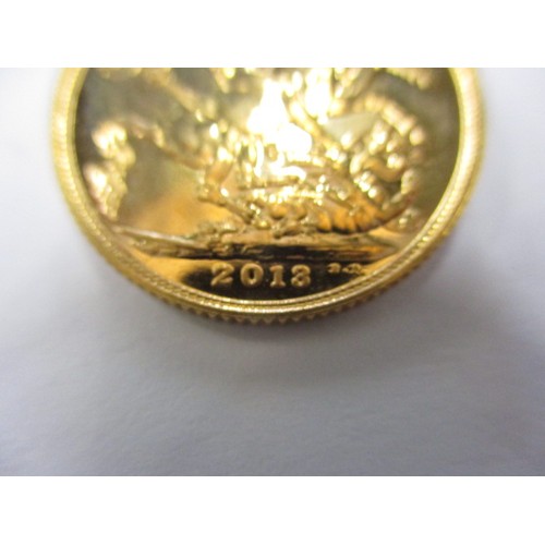 70 - A QEII full gold sovereign dated 2013, an uncirculated coin with minor surface marks