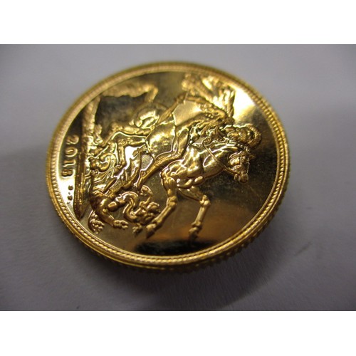 70 - A QEII full gold sovereign dated 2013, an uncirculated coin with minor surface marks