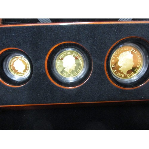 105 - A Royal Mint Premium Britannia Three Coin Gold Proof set, all in mint condition and with original pa... 